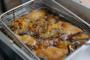 Food frying in a basket