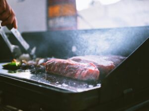 Steak searing on the flat-top griddle