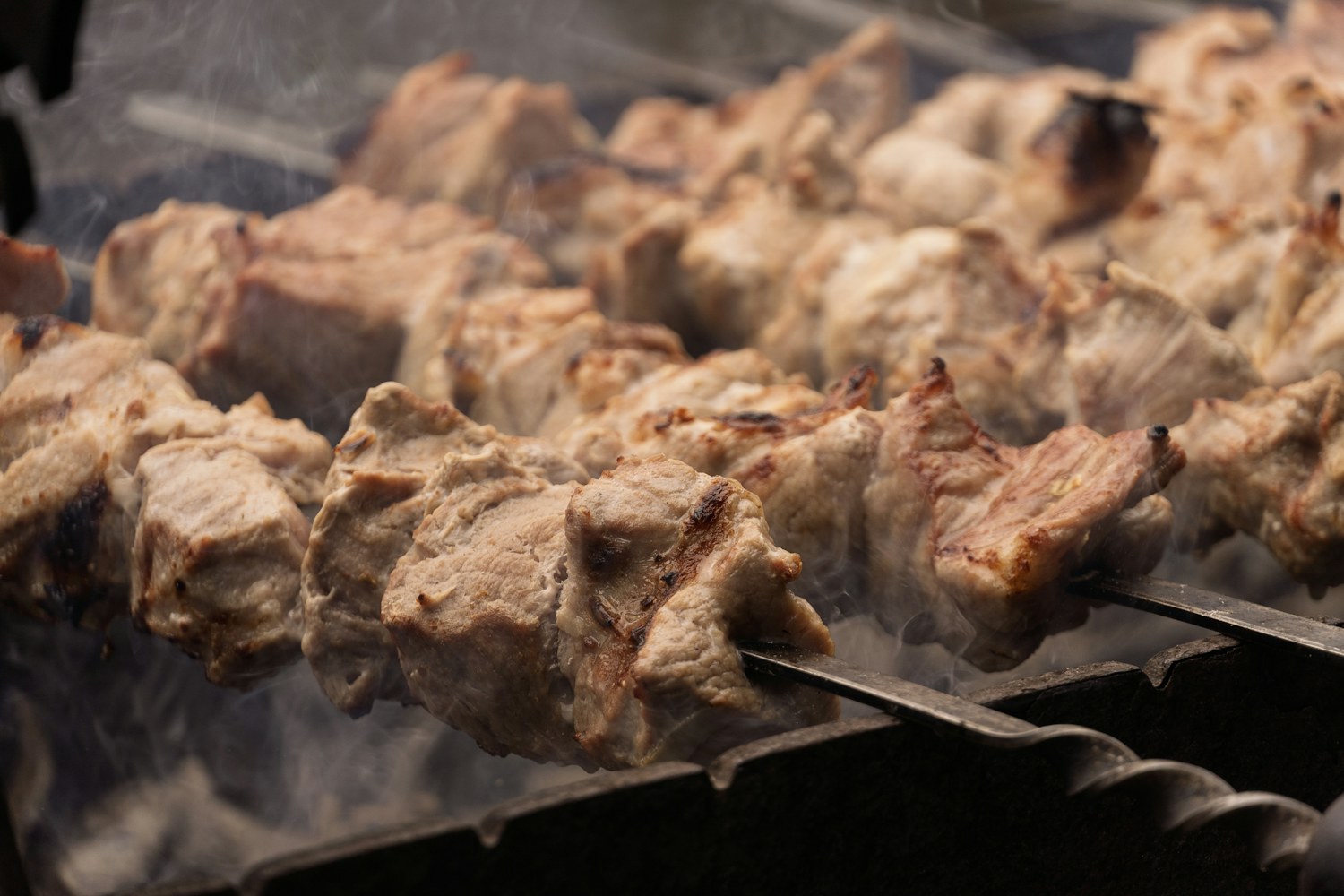 Seasoned meat carved from a vertical rotisserie