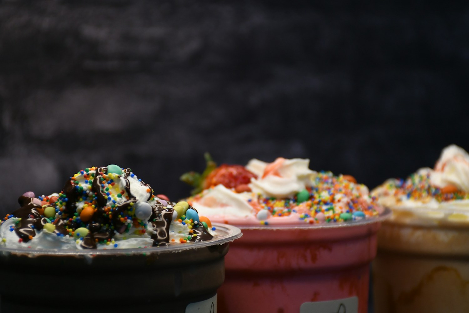 Rolled ice cream served with toppings