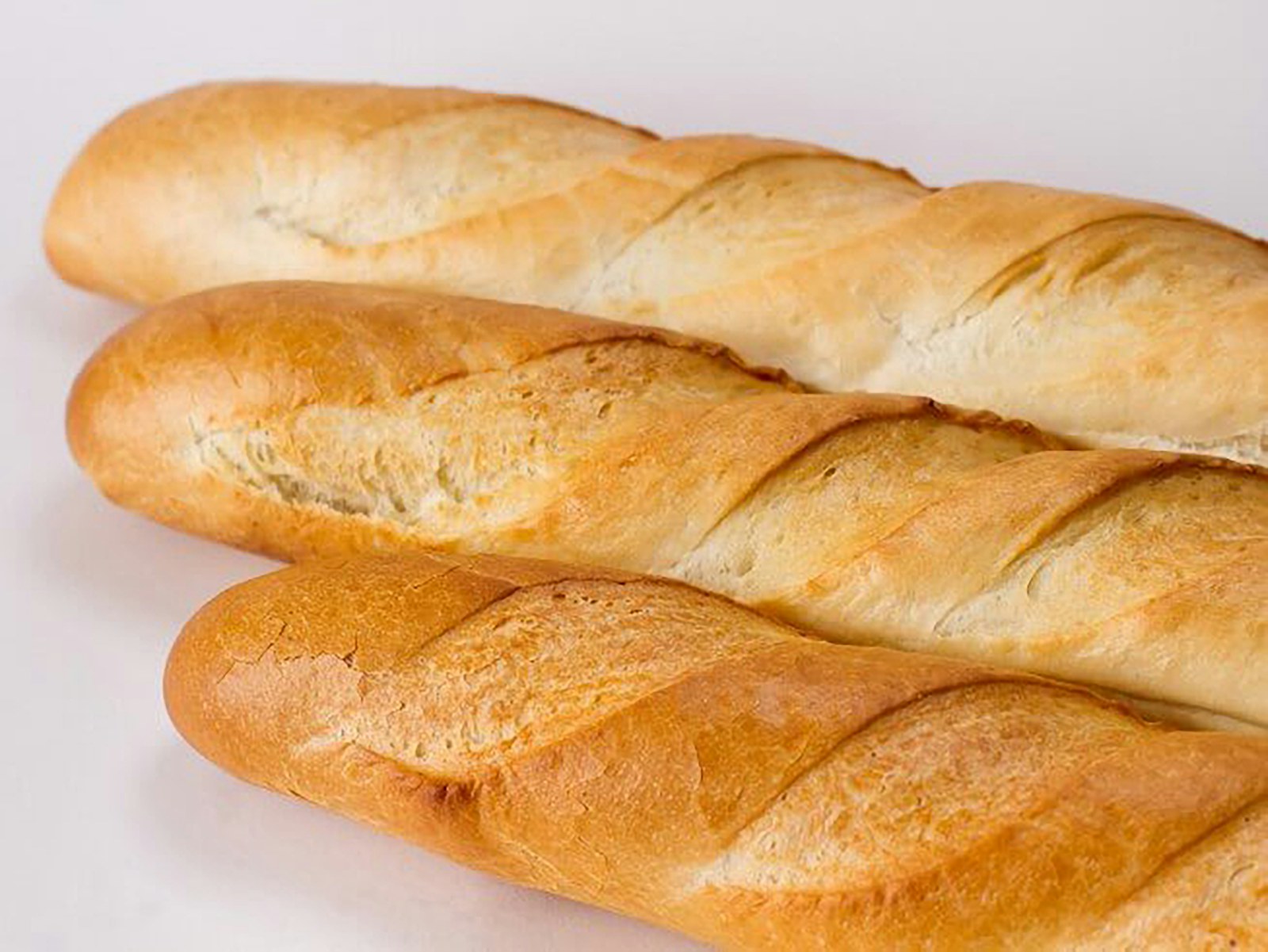 Crusty French bread loaves with a hard outer crust