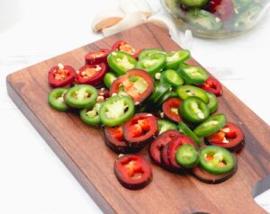 Sliced jalapenos and red chillies
