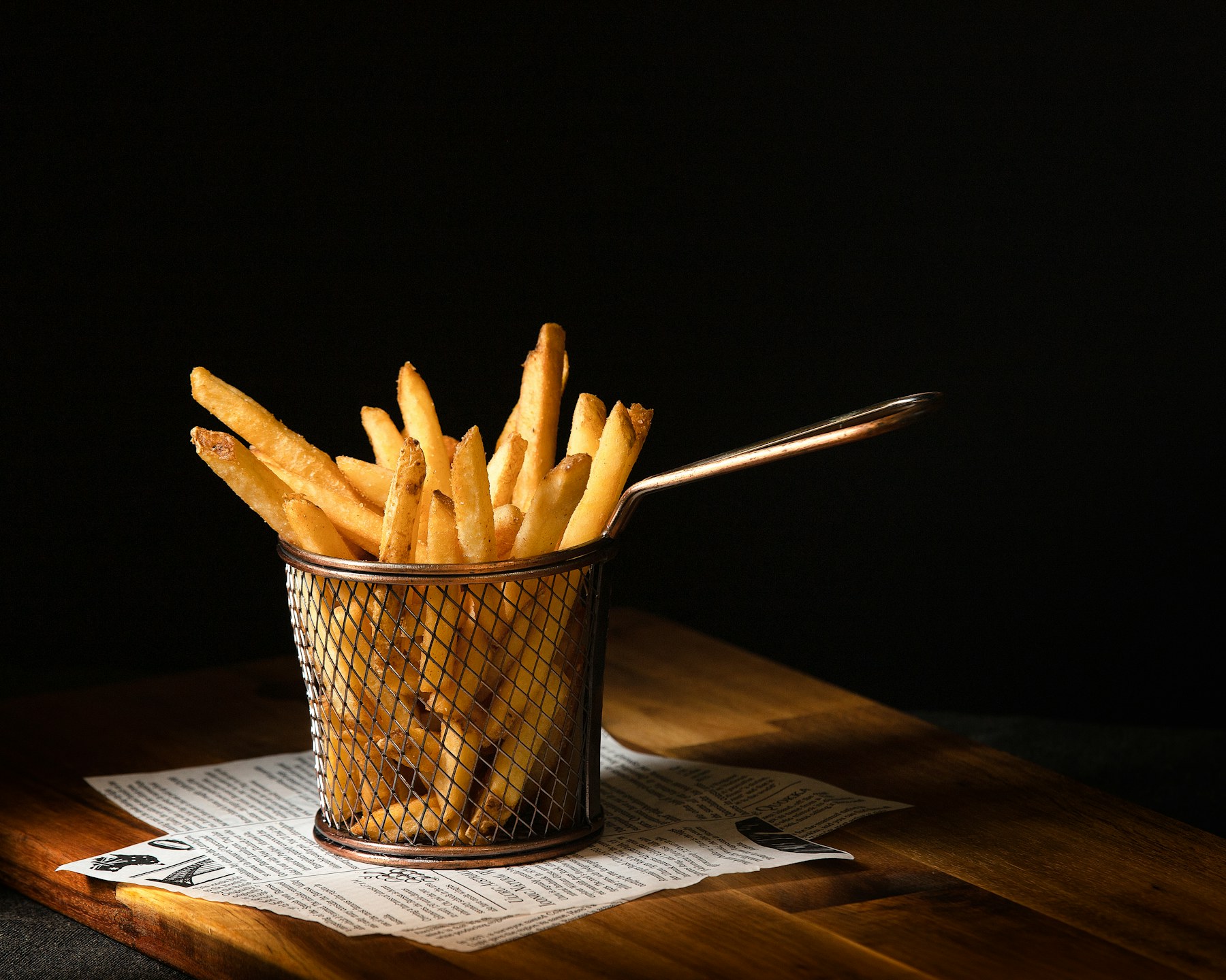 Fries served in a wire basket