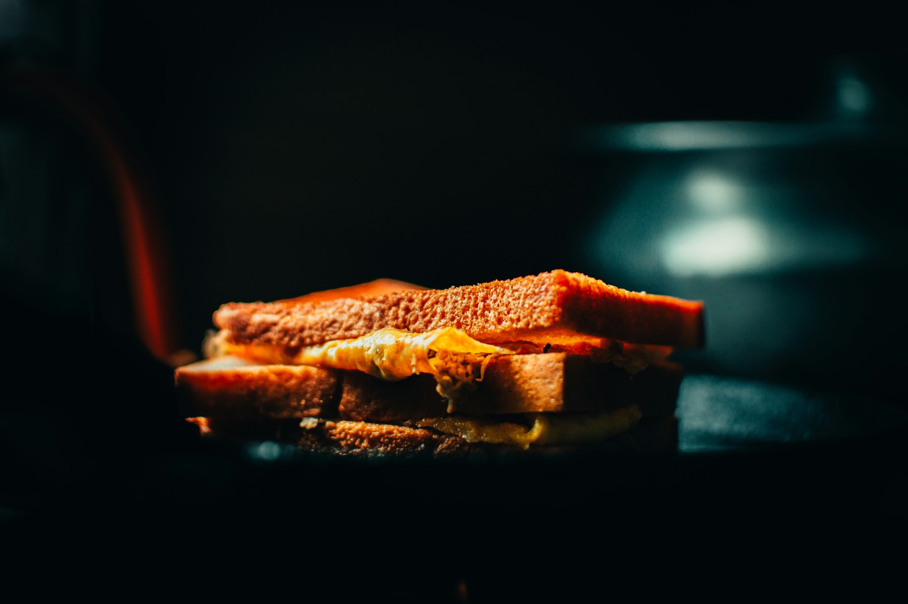 Toasted sandwich with cheese melting at the edges