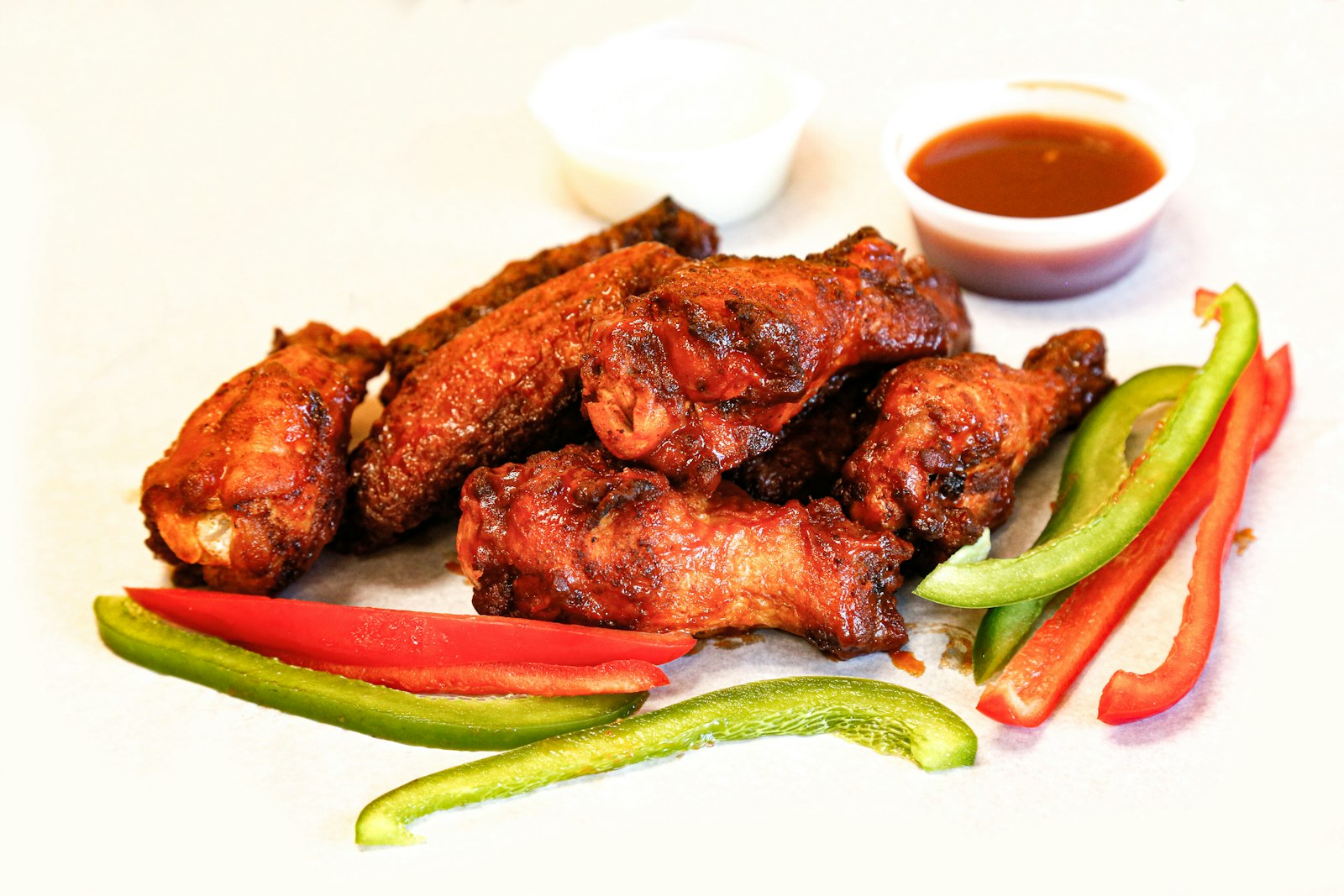 Crispy hot wings in a basket