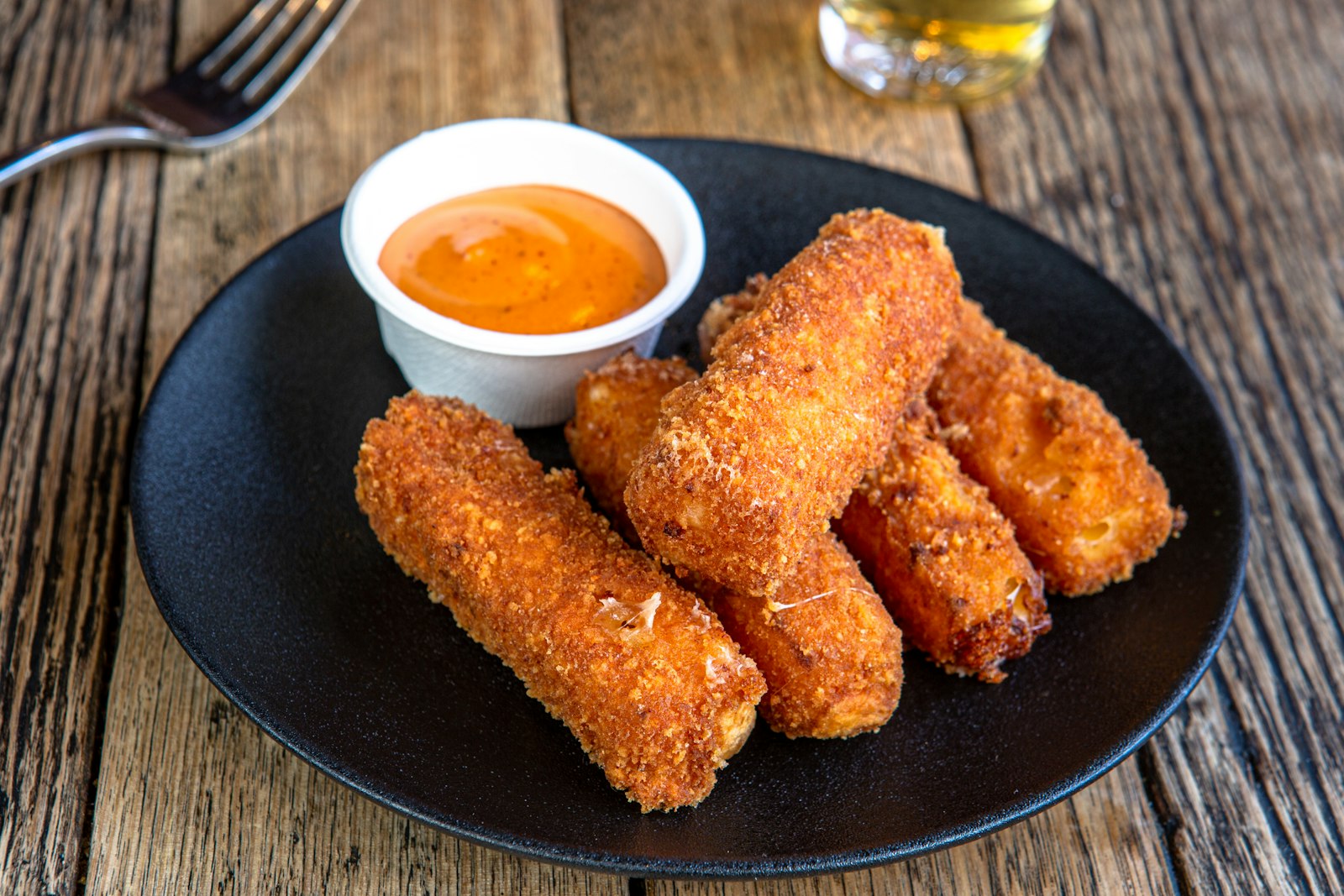 Mozzarella sticks served with marinara sauce