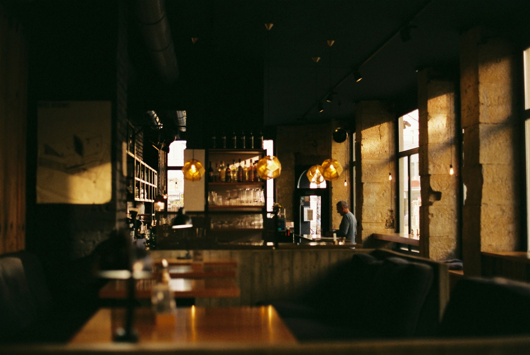 Warm, low-lit dining room in the evening